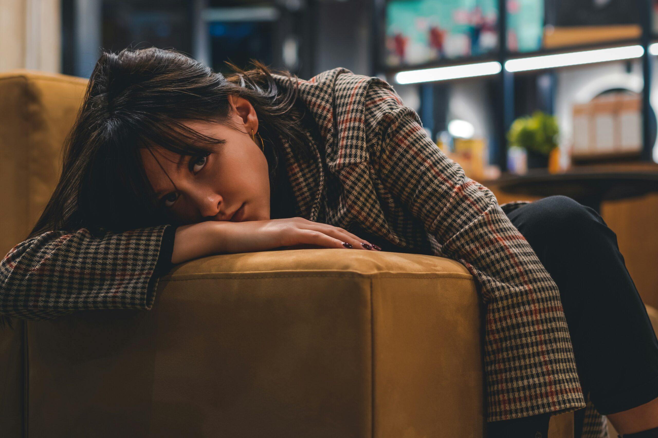 Woman appearing emotionally drained after talking to certain people